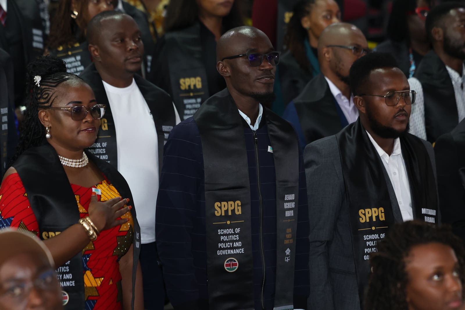 SPPG Kenya students standing for the national anthem